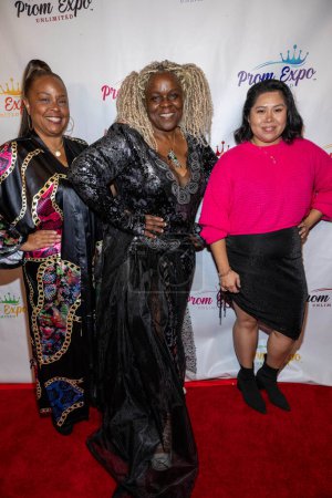 Photo for Co-founder Octavia Clayton, Founder/Designer StormyWeather Banks, Event coordinator Marlene Flores attend  Prom Expo Unlimited  Fortunate Fabrics Mixer at Private Residence, Los Angeles, November 11, 2023 - Royalty Free Image