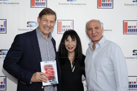 Photo for Actor Michael Pare, Ava's Heart Founder and Executive Director Ava Kaufman, Raffi Dilsizian American Post 'N Parcel store owner attend Suzanne DeLaurentiis Productions Shopping event to benefit Ava's Heart Foundation at Target Shopping, Los Angeles, - Royalty Free Image