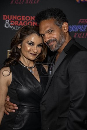 Photo for Actress Anjali Bhimani, Actor Khary Payton attend Dungeons and Dragons Adventures screening event at E.P. and L.P. rooftop, Los Angeles, CA November 13, 2023 - Royalty Free Image