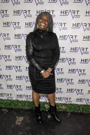 Photo for Actress Youlanda Davis attends J. Michael Arnoldi Birthday Bash and Toy Drive featuring Performance of G Tom Mac at Heart WeHo Night club in West Hollywood, Los Angeles, CA December 9, 2023 - Royalty Free Image