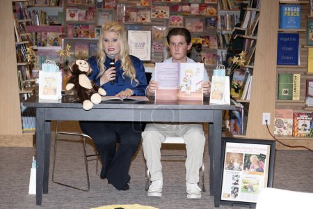Photo for Author Rachele Sweetser with son attends Author Rachele Sweetser's "Monkey-Boy - The Adventures of a Boy with ADHD" book signing at Barnes and Noble at the Grove, Los Angeles, CA, January 15th, 2024 - Royalty Free Image