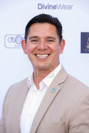 Photo for Lakewood City Council David Arellano attends 2024 Prom Expo Unlimited and fashion show at Earvin Magic Johnson Park & Community Event Center , Los Angeles, CA, March 9, 2024 - Royalty Free Image