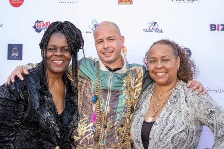 Photo for Founder Designer of Prom Expo Unlimited StormyWeather Banks, Jewelry Designer Xavier Madera, Co-founder of Prom Expo Unlimited Octavia Clayton attend 2024 Prom Expo Unlimited and fashion show at Earvin Magic Johnson Park & Community Event Center - Royalty Free Image