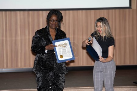 Photo for Founder Designer of Prom Expo Unlimited StormyWeather Banks receiving an award at 2024 Prom Expo Unlimited and fashion show at Earvin Magic Johnson Park & Community Event Center , Los Angeles, CA, March 9, 2024 - Royalty Free Image