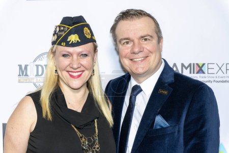 Photo for Former Navy VME Tracy Martin with fiance David Langford attends The 2024 Annual Suzanne Delaurentiis Gala, Luncheon And Gifting Suite honoring our veterans and Celebrating The 96th Oscars at Luxe Sunset Blvd Hotel, Los Angeles, CA, March 10, 2024 - Royalty Free Image