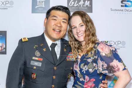 Photo for Lt. Tim Yao with wife attends The 2024 Annual Suzanne Delaurentiis Gala, Luncheon And Gifting Suite honoring our veterans and Celebrating The 96th Oscars at Luxe Sunset Blvd Hotel, Los Angeles, CA, March 10, 2024 - Royalty Free Image