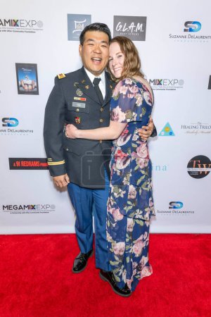 Photo for Lt. Tim Yao with wife attends The 2024 Annual Suzanne Delaurentiis Gala, Luncheon And Gifting Suite honoring our veterans and Celebrating The 96th Oscars at Luxe Sunset Blvd Hotel, Los Angeles, CA, March 10, 2024 - Royalty Free Image