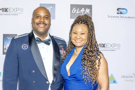 Photo for CEO of Total Beauty Supply, Captain Pierre and Candice Sutton attend The 2024 Annual Suzanne Delaurentiis Gala, Luncheon And Gifting Suite honoring our veterans and Celebrating The 96th Oscars at Luxe Sunset Blvd Hotel, Los Angeles, CA, March 10, 202 - Royalty Free Image