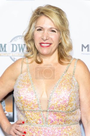 Photo for Wellness Innovator Penny Foskaris attends The 2024 Annual Suzanne Delaurentiis Gala, Luncheon And Gifting Suite honoring our veterans and Celebrating The 96th Oscars at Luxe Sunset Blvd Hotel, Los Angeles, CA, March 10, 2024 - Royalty Free Image