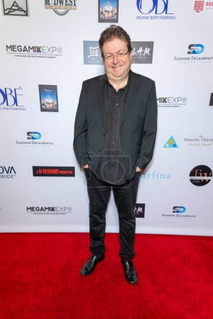 Photo for Director Roel Reine attends The 2024 Annual Suzanne Delaurentiis Gala, Luncheon And Gifting Suite honoring our veterans and Celebrating The 96th Oscars at Luxe Sunset Blvd Hotel, Los Angeles, CA, March 10, 2024 - Royalty Free Image