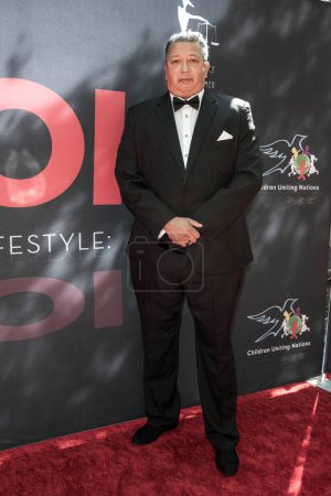 Photo for Producer Harold Whitfield attends Children Uniting Nations 24th Annual Academy Awards Celebration and Oscars Viewing Dinner at The Historic Warner Bro. Estate, Los Angeles, CA, March 10, 2024 - Royalty Free Image