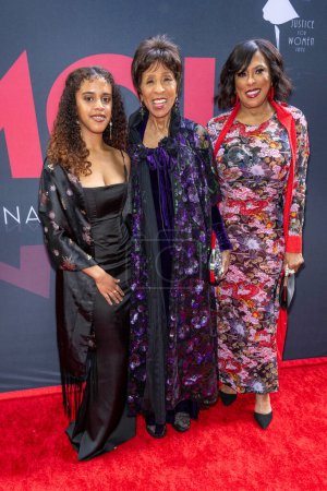 Photo for Aila Gibbs Great granddaughter of Marla Gibbs, Actress Angela Elayne Gibbs, Marla Gibbs daughter, Actress and Singer Marla Gibbs attend Children Uniting Nations 24th Annual Academy Awards Celebration and Oscars Viewing Dinner at The Historic Warner B - Royalty Free Image