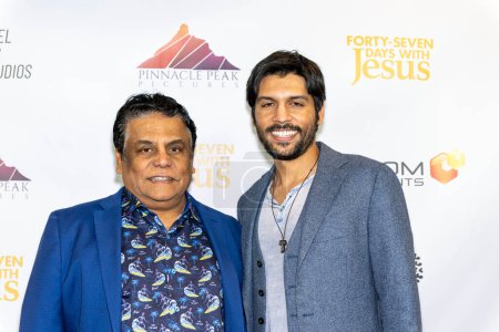 Photo for Actor Patrick Rutnam with father attends Los Angeles Premiere of the film "Forty-Seven Days with Jesus" at AMC Burbank 16, Los Angeles, CA, March 11, 2024 - Royalty Free Image