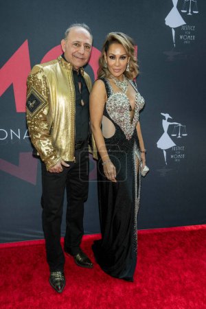 Photo for Designer Jacob Meir, Connie Pena attend Children Uniting Nations 24th Annual Academy Awards Celebration and Oscars Viewing Dinner at The Historic Warner Bro. Estate, Los Angeles, CA, March 10, 2024 - Royalty Free Image