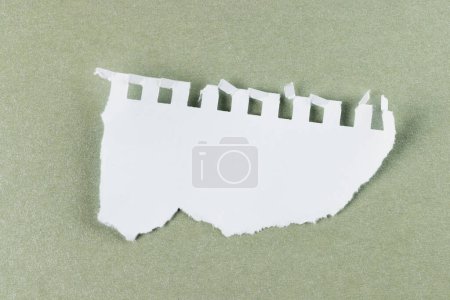 Photo for Ripped up piece of white paper with copy space on cardboard background. Abstract paper texture background and communication concept. - Royalty Free Image