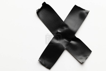 Photo for Cross shape black masking tape on white background. Abstract paper texture background and communication concept. - Royalty Free Image