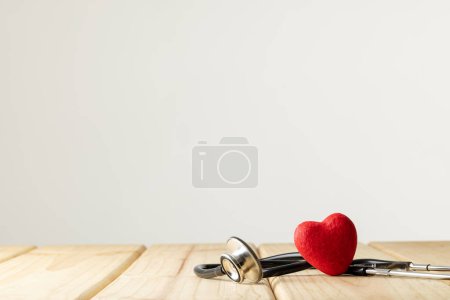 Photo for Composition of stethoscope and red heart on white background with copy space. Medical services, healthcare and health awareness concept. - Royalty Free Image