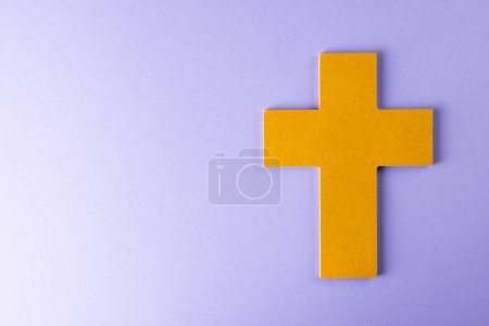 Photo for Composition of christian ash wednesday cross on purple background with copy space. Faith, christianity, celebration and tradition concept. - Royalty Free Image