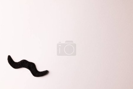 Photo for Composition of fake moustache on white background with copy space. Fake moustache day, party, celebration and costume concept. - Royalty Free Image