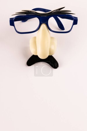 Photo for Composition of fake moustache with nose and glasses on white background with copy space. Fake moustache day, party, celebration and costume concept. - Royalty Free Image