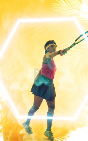 Photo for Composite image of determined young african american female athlete playing tennis over leaf pattern. Multiple exposure, copy space, determination, fitness, sport, aspirations, athlete, frame. - Royalty Free Image