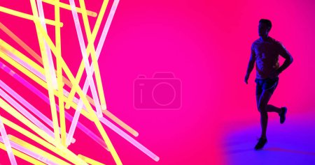 Téléchargez les photos : Jeune sportif caucasien au design néon coloré sur fond rose, espace de copie. Informatique graphique, composite numérique, couleur vibrante, design, athlète, sport. - en image libre de droit