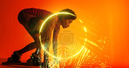 Photo for Side view of biracial female athlete at starting position by illuminated plants and circle. Copy space, composite, sprinting, sport, competition, running, racing, shape, nature and abstract concept. - Royalty Free Image