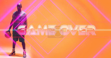 Photo for Composite of game over text with pink lines and bald african american basketball player with ball. Orange, copy space, the end, match, sport, competition, illustration, glowing, shape and abstract. - Royalty Free Image