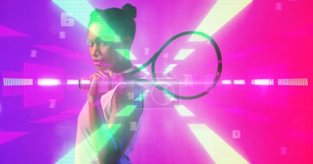 Photo for Side view of biracial female tennis player with racket standing over illuminated light beams. Copy space, contemplation, composite, sport, competition, match, glowing, shape and abstract concept. - Royalty Free Image