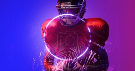 Photo for Composite of american football player in helmet holding ball by glowing plants and circle. Copy space, illuminated, sport, competition, illustration, nature, shape and abstract concept. - Royalty Free Image