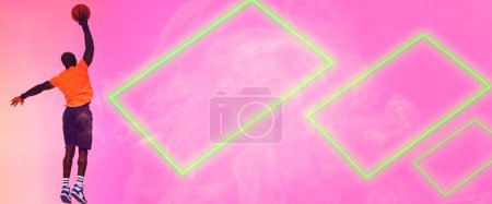 Photo for Rear view of african american player taking a shot with basketball by rectangles on pink background. Copy space, composite, smoke, sport, competition, illustration, glowing, shape and abstract. - Royalty Free Image
