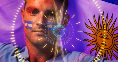 Photo for Close-up caucasian soccer player with argentina flag and paints on face over illuminated circles. Portrait, serious, face, composite, sport, competition, patriotism, shape and abstract concept. - Royalty Free Image
