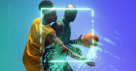 Photo for African american players defending basketball ball from opponent by illuminated circle and plants. Copy space, blue, composite, sport, competition, illustration, glowing, nature and shape concept. - Royalty Free Image