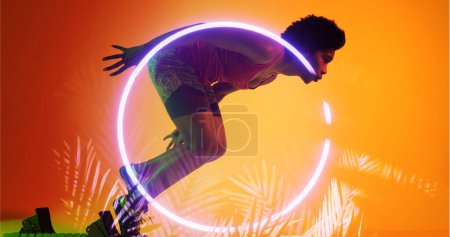 Photo for Side view of biracial female athlete running from starting position by illuminated plants and circle. Copy space, composite, sprinting, sport, competition, racing, shape, nature and abstract concept. - Royalty Free Image