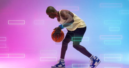 Photo for Side view of bald african american basketball player dribbling ball over illuminated rectangles. Copy space, composite, playing, sport, competition, illustration, shape and abstract concept. - Royalty Free Image