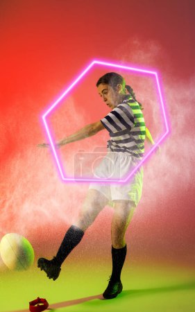 Photo for Illuminated hexagon over caucasian female rugby player kicking ball amidst smoke, copy space. Composite, sport, competition, shape, playing, match and abstract concept. - Royalty Free Image