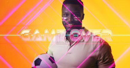 Photo for African american soccer player with england flag's face paint with game over text over lines. Ball, the end, copy space, composite, sport, portrait, competition, patriotism and abstract concept. - Royalty Free Image