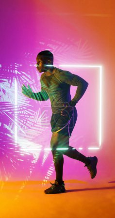 Photo for Side view of african american rugby player running by illuminated square and plants, copy space. Composite, sport, competition, shape, nature, playing, match and abstract concept. - Royalty Free Image