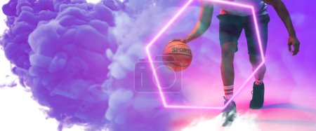 Photo for Low section of biracial basketball player dribbling ball by illuminated hexagon on smoky background. Copy space, composite, blue, sport, competition, illustration, shape and abstract concept. - Royalty Free Image