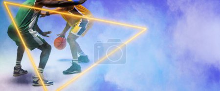 Foto de Low section of multiracial male players playing basketball by triangles against blue background. Opponent, defend, copy space, composite, illuminated, sport, competition, illustration, shape, smoke. - Imagen libre de derechos
