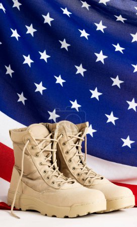 Photo for Military boots over flag of usa on white background, with copy space. Memorial day, patriotism and celebration concept. - Royalty Free Image