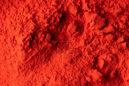 Foto de Close up of red powder background, with copy space. Holi festival, colour, hindu tradition and celebration concept. - Imagen libre de derechos