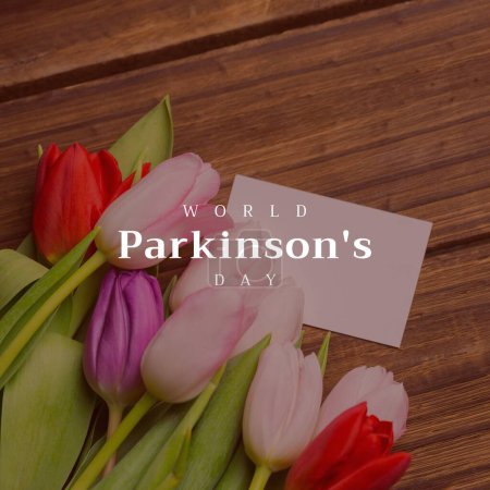 Téléchargez les photos : Texte composite de la journée mondiale de la maladie de Parkinson sur des tulipes colorées avec une note vierge sur une table en bois. Copier l'espace, la nature, la sensibilisation, le système nerveux, la campagne, les soins de santé, le soutien et la prévention concept. - en image libre de droit
