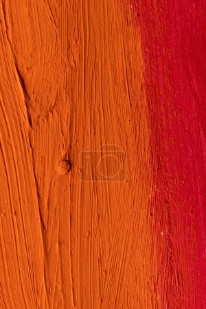 Foto de Primer plano de rayas de pintura naranja y roja con espacio para copiar. Fondo, patrón y color abstractos. - Imagen libre de derechos