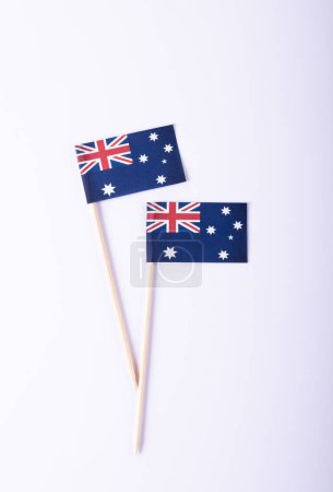 Photo for Overhead view of australian flags against white background, copy space. national flag, blue, patriotism, identity, freedom concept. - Royalty Free Image