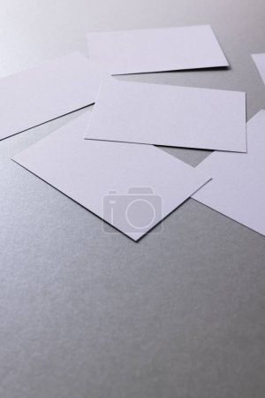 Photo for White business cards with copy space on grey background. Business, business card, stationery and writing space digitally generated image. - Royalty Free Image