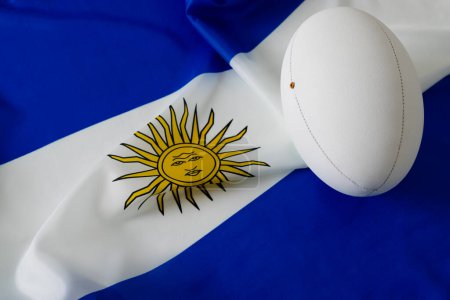 Photo for White rugby ball over flag of argentina. Rugby, sport, international, competition and games digitally generated image. - Royalty Free Image