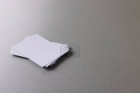 Photo for Stack of white business cards with copy space on grey background. Business, business card, stationery and writing space digitally generated image. - Royalty Free Image