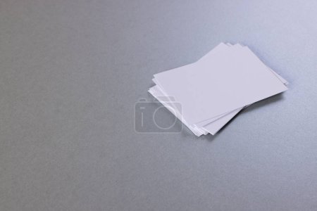 Photo for White business cards with copy space on grey background. Business, business card, stationery and writing space digitally generated image. - Royalty Free Image
