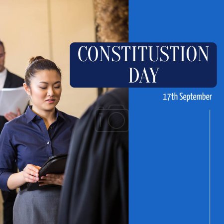 Photo for Constitution day text in white on blue with asian female attorney at work. American constitution and federal government law celebration day digitally generated image. - Royalty Free Image